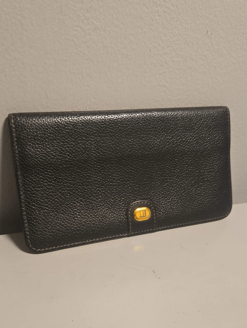 Dunhill Black Pebble Leather Continental Wallet with Gold Accent